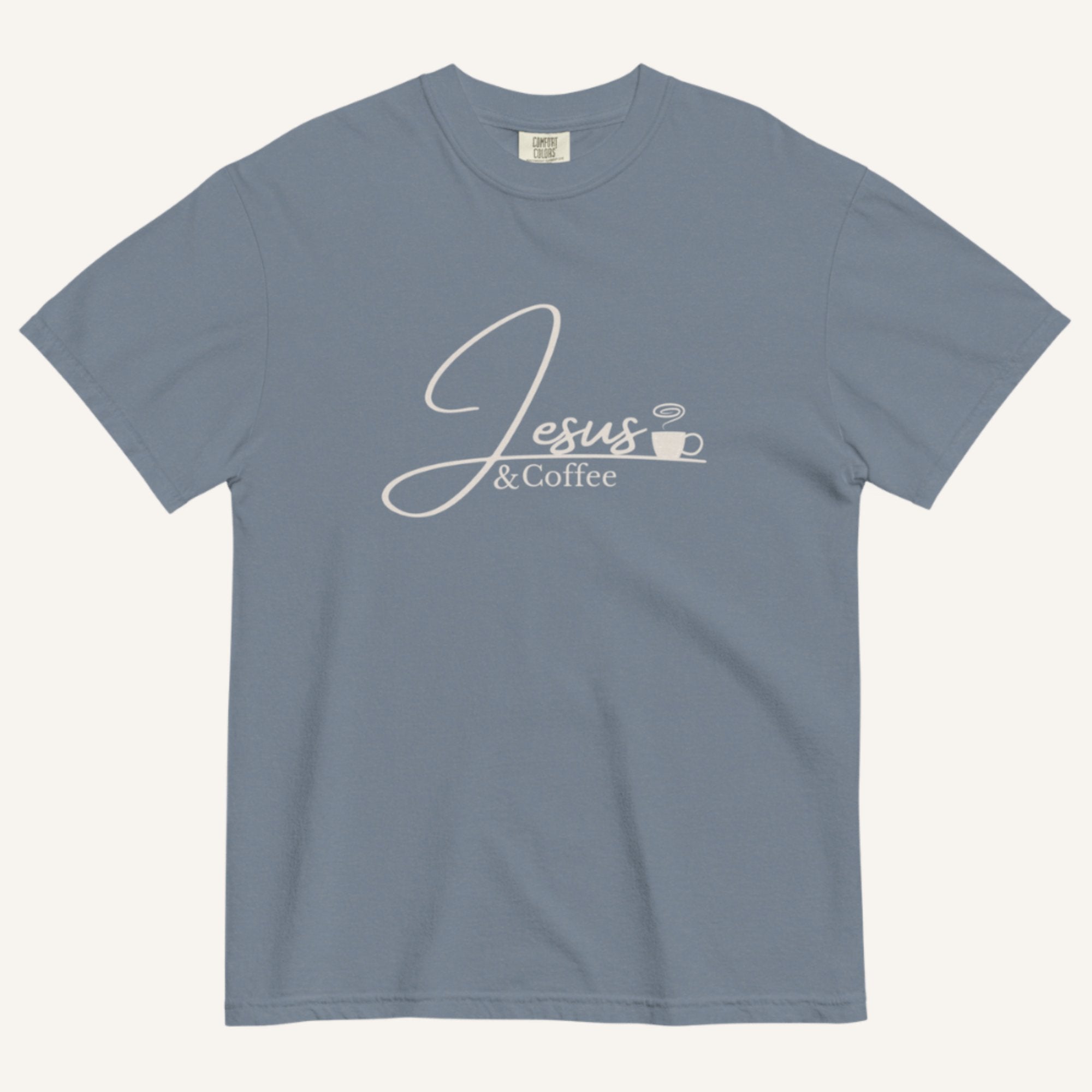 Blue t-shirt with 'Jesus & Coffee' text on a white background