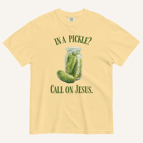 muted yellow colored t-shirt with pickle jar graphic and 'In a Pickle? Call on Jesus' text in green