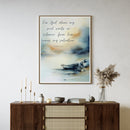 Bible verse with boat in water art piece hanging on a living room wall