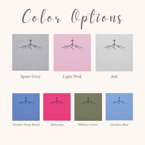 Color options chart showing eight square swatches with a simple mountain-and-cross line drawing, labeled Sport Grey, Light Pink, Ash, Heather Deep Royal, Heliconia, Military Green, and Carolina Blue under the heading 'Color Options'.