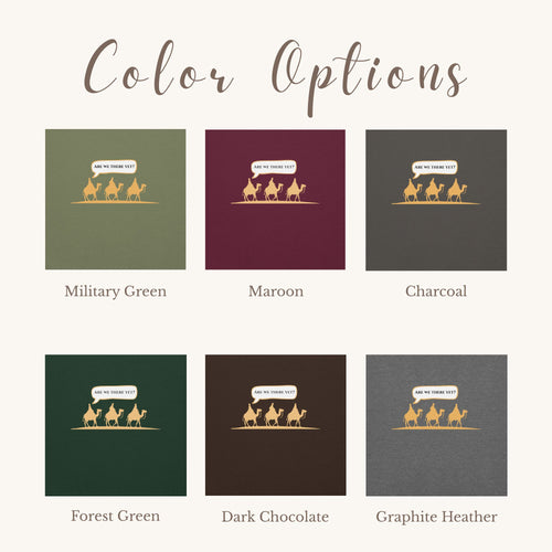 Color options for the crewneck sweatshirt "Are we there yet?" with 3 men riding a camel graphic