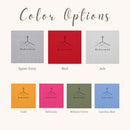 Color options chart for the Redeemed crewneck sweatshirt, showing seven square swatches with a cross graphic and text. The colors include Sport Grey, Red, Ash, Orange, Heliconia, Military Green, and Carolina Blue, labeled on a light cream background under the heading 'Color Options'.