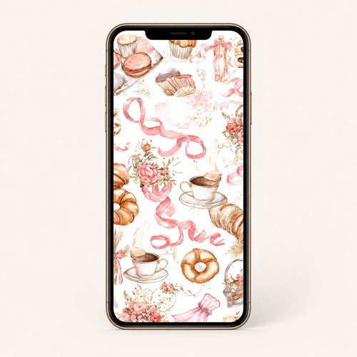 Smartphone with a decorative wallpaper featuring pastries and ribbons on a white background