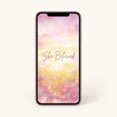Smartphone with a floral design and 'She Believed' text on a white background