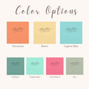 Color options chart showing eight flat color swatches of two fish and five loaves of bread line drawings labeled Terracotta, Butter, Lagoon Blue, Seafoam, Chalky Mint, Crunchberry, and Bay under the heading 'Color Options' on a light beige background.